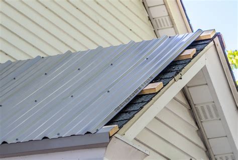 this old house metal roof|reroof over existing metal roof.